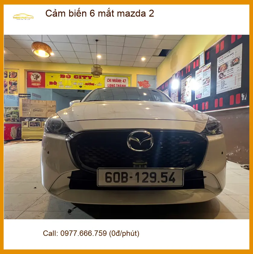 Chị Phương lắp cảm biến 6 mắt Mazda 2 tại Quận 9 để đỗ xe dễ dàng hơn ảnh thực tế 2