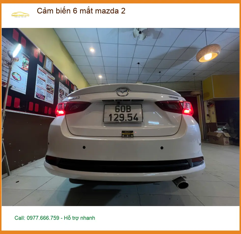 Anh Long lắp cảm biến 6 mắt Mazda 2 tại Quận Thủ Đức vì hay đỗ xe khu đông đúc
