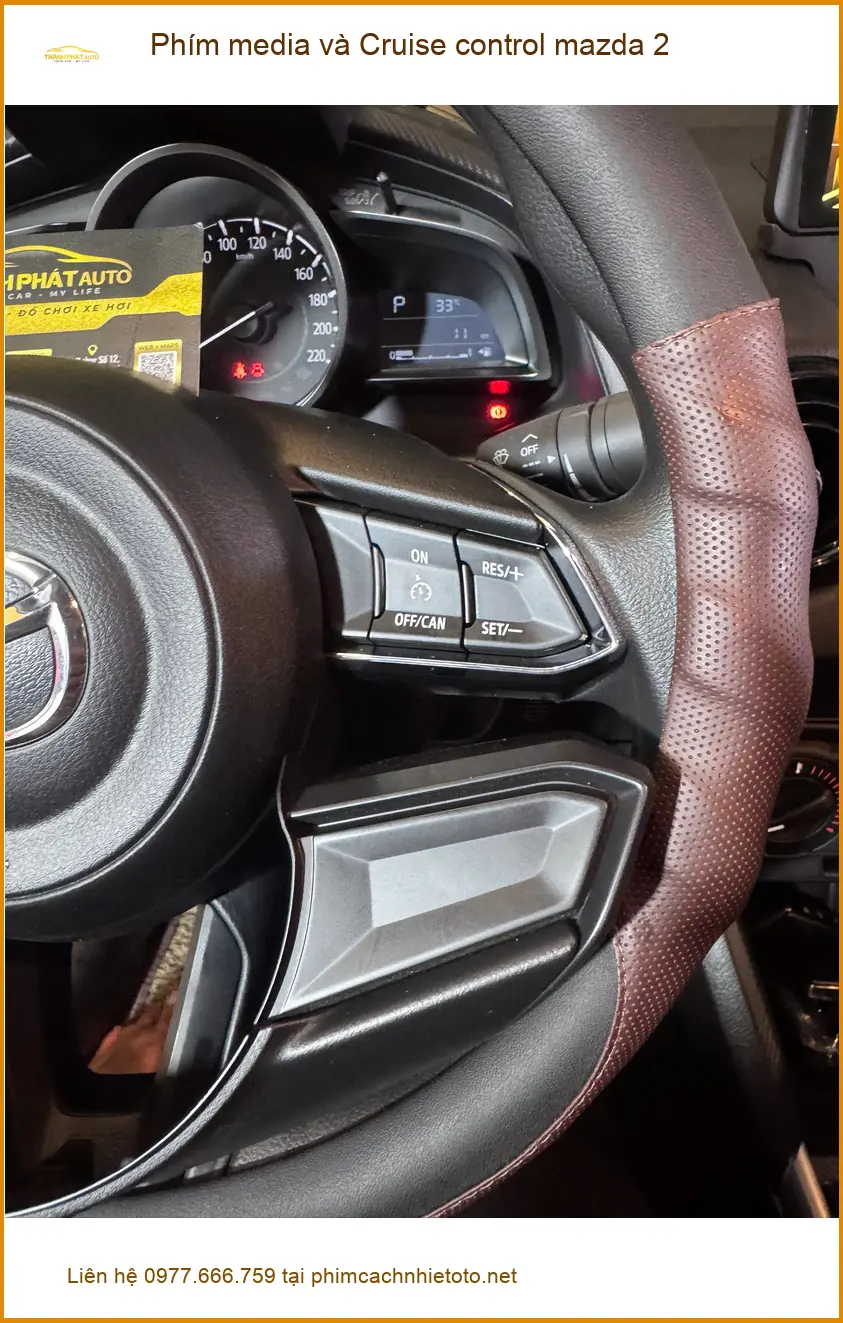 Anh Kiên lắp phím media và Cruise control Mazda 2 Bình Chánh tiện lợi
