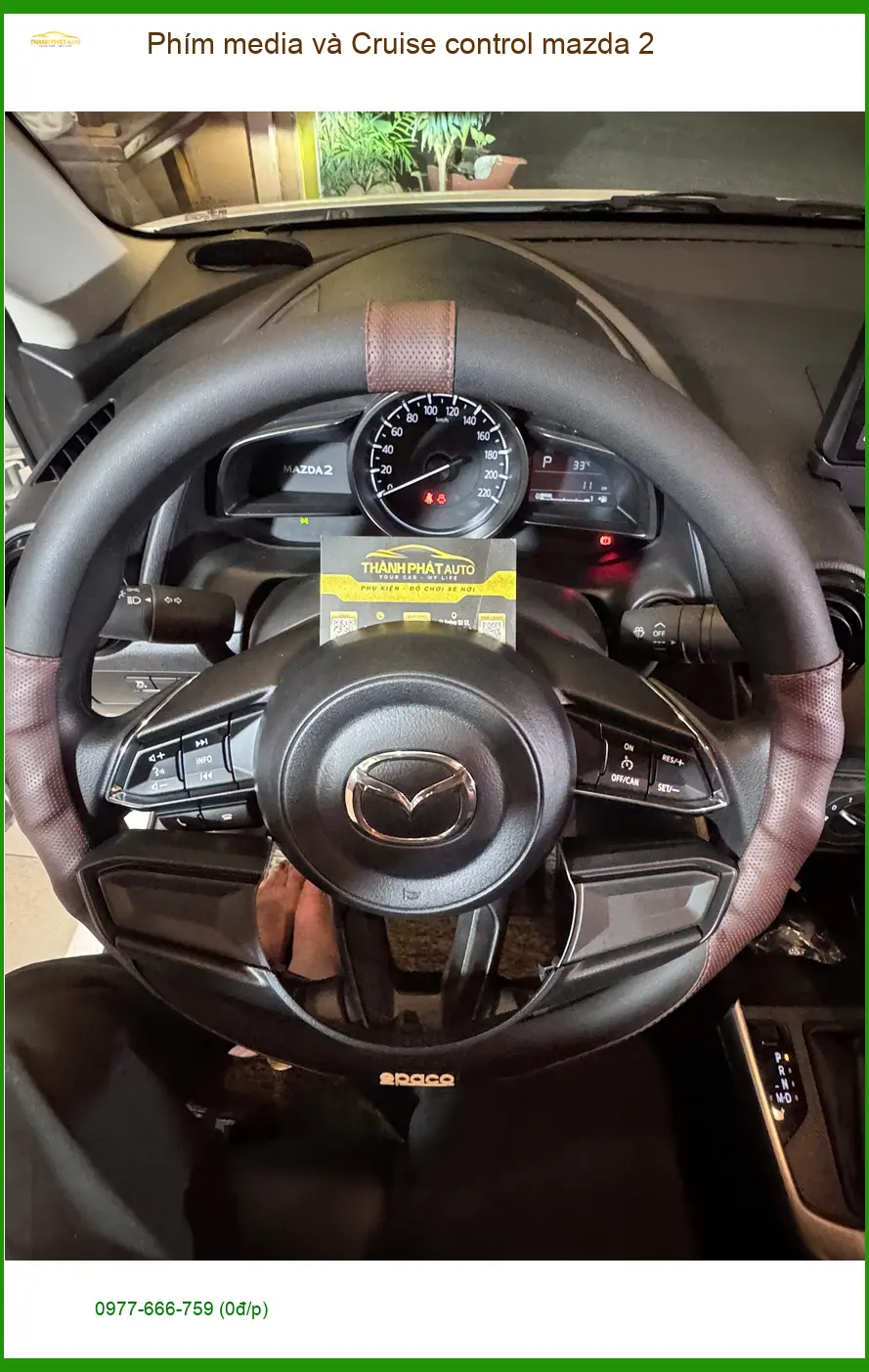 Chị Thảo lắp Phím media và Cruise control cho Mazda 2 tại Quận 3 để lái xe tiện lợi hơn ảnh thực tế 4