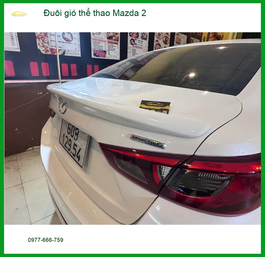 Anh Tuấn Kiệt lắp đuôi gió thể thao Mazda 2 Quận 2 tăng vẻ cá tính