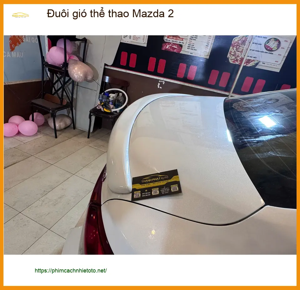 Anh Tuấn Kiệt lắp đuôi gió thể thao Mazda 2 Quận 2 tăng vẻ cá tính ảnh thực tế 4