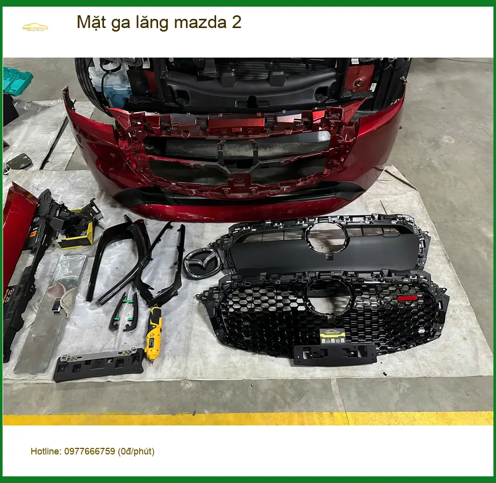Chú Phát lắp Mặt ga lăng Mazda 2 mới tại Quận Phú Nhuận để xe trông hiện đại hơn. ảnh thực tế 2