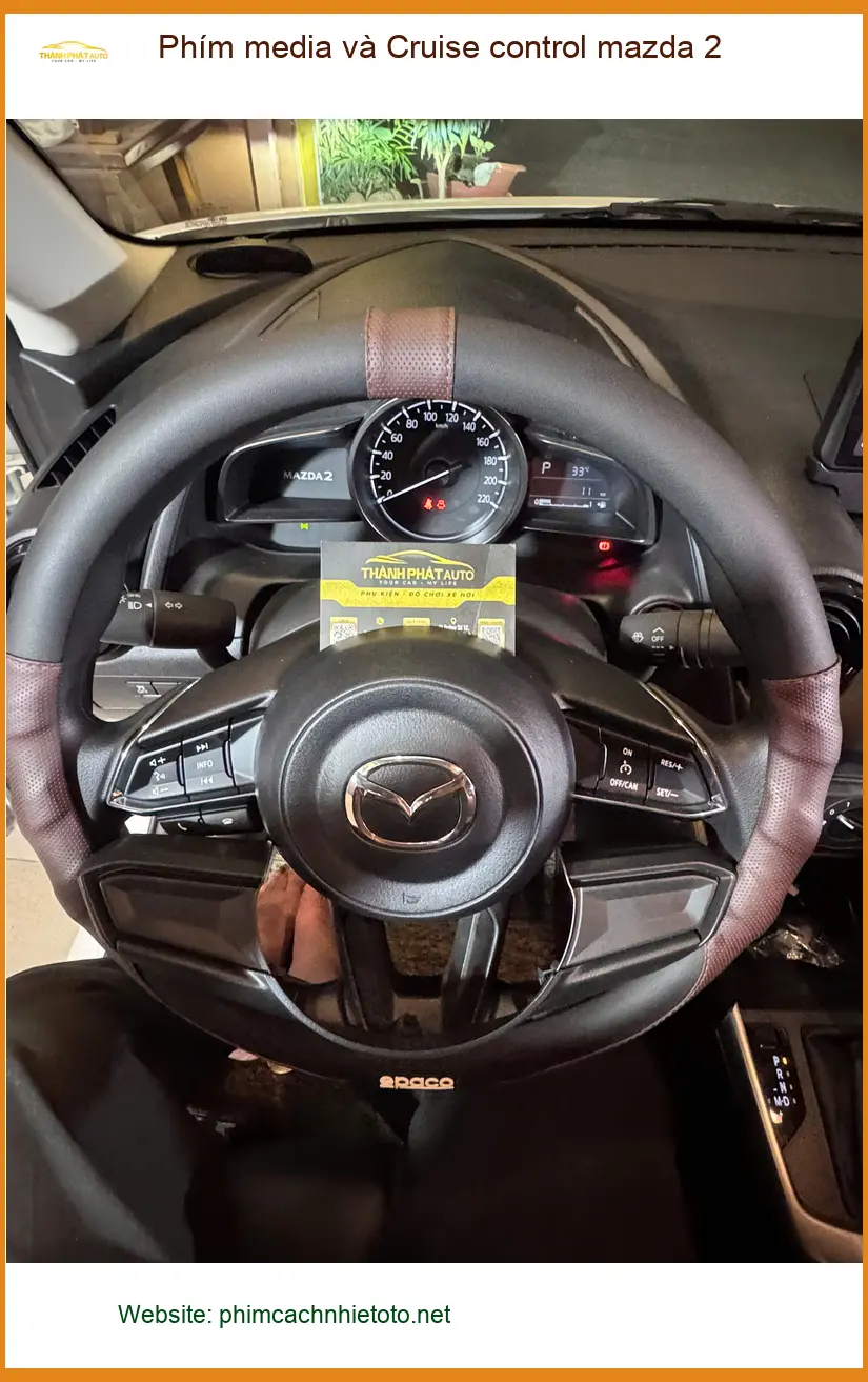 Anh Dũng lắp Phím media và Cruise control Mazda 2 ở Củ Chi để lái tiện lợi ảnh thực tế 5